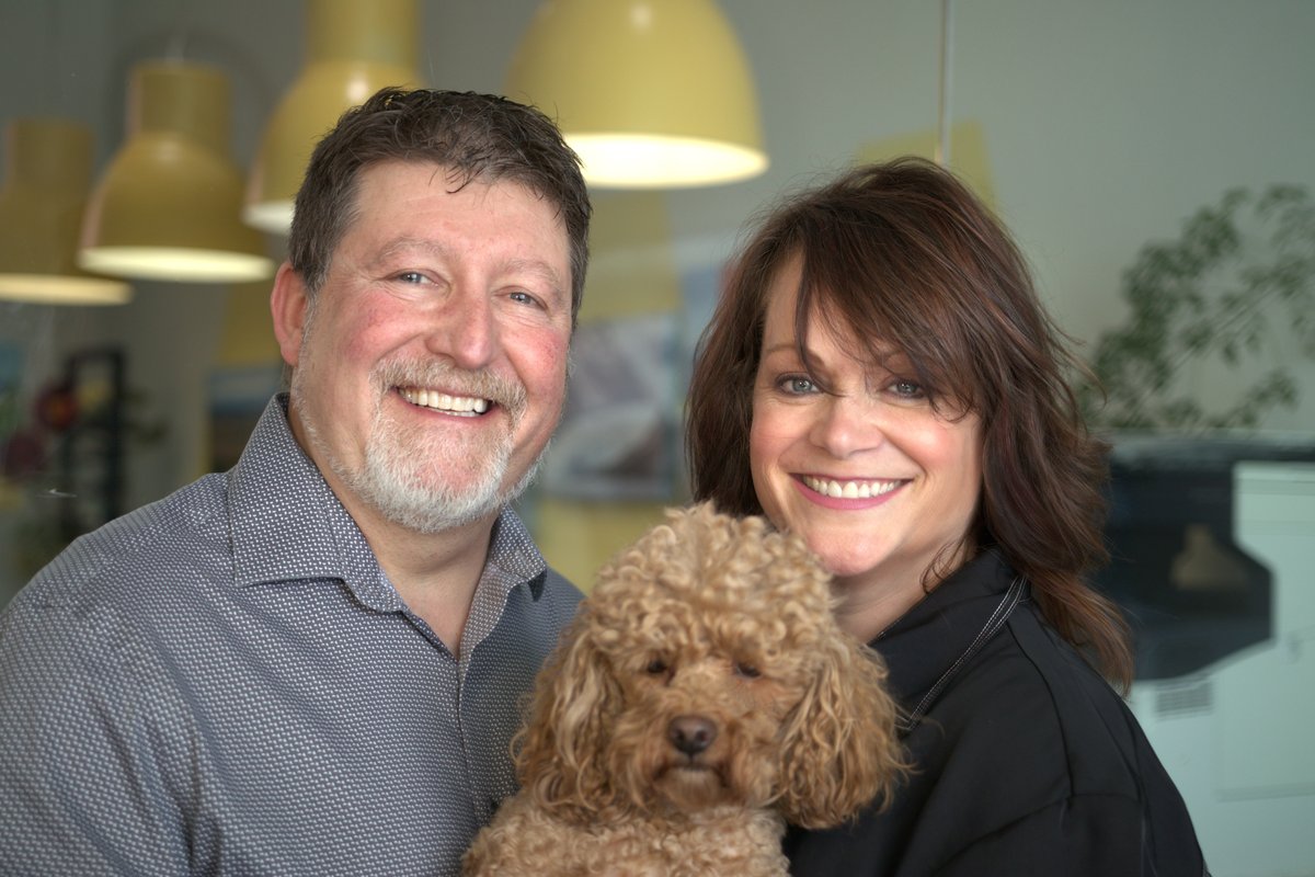 Larry and Jacque Ficek, founders of BHG Dream Makers, with their dog Uka